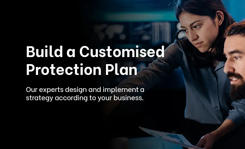 Team discussing a tailored cybersecurity plan, reflecting personalized protection strategies for businesses.