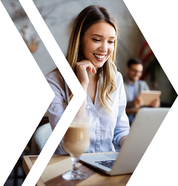 Exigo Tech promotes a workshop on automating workflows and building apps using Power Platform’s low-code capabilities, featuring a smiling woman engaging with a laptop in a collaborative environment.