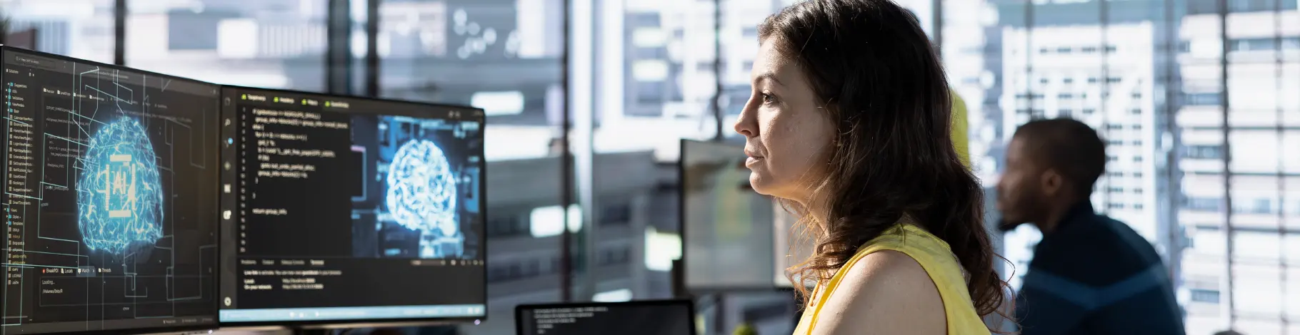 Professional analyzing AI-driven insights on a computer screen in a modern office, showcasing Azure AI Services for Australian enterprises