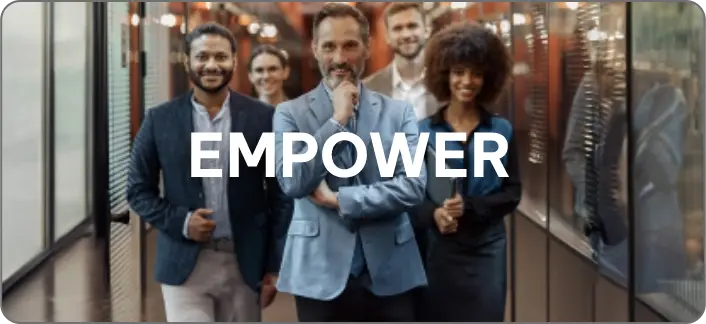 Confident business professionals walking in a modern office hallway, symbolizing empowerment. The word 'EMPOWER' is overlaid on the image.