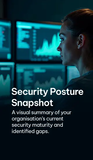 Professional reviewing security data on multiple monitors, analyzing security posture - For Mobile version
