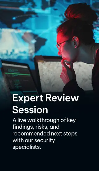 Security specialist reviewing data and findings on multiple monitors during an expert session - For Mobile version