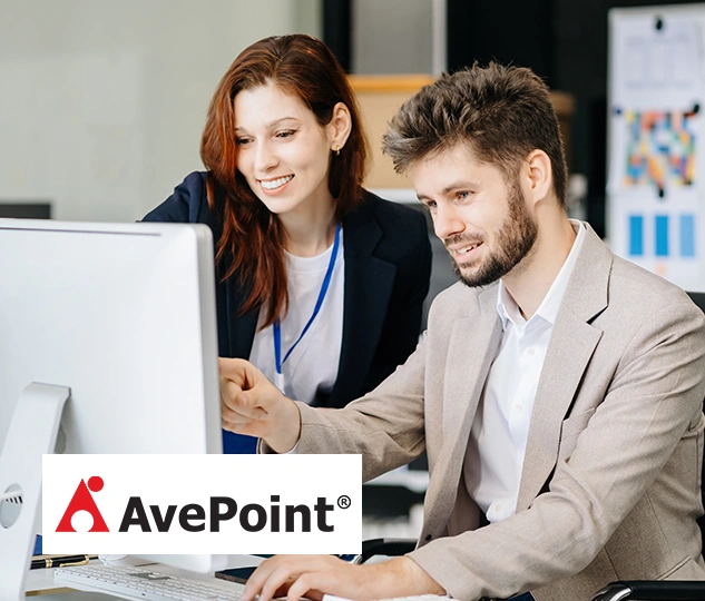 Business team using AvePoint backup solutions to protect Microsoft 365, Teams, and SharePoint data.