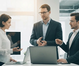 Executives discussing cybersecurity strategies focused on risk reduction, brand protection, and business continuity. Executives discussing cybersecurity strategies focused on risk reduction, brand protection, and business continuity.