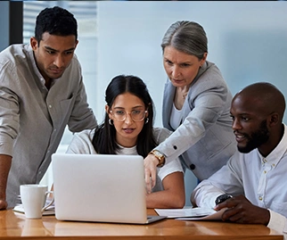 Business team reviewing compliance reports and uptime metrics to reduce risk and enhance operational security. Business team reviewing compliance reports and uptime metrics to reduce risk and enhance operational security.