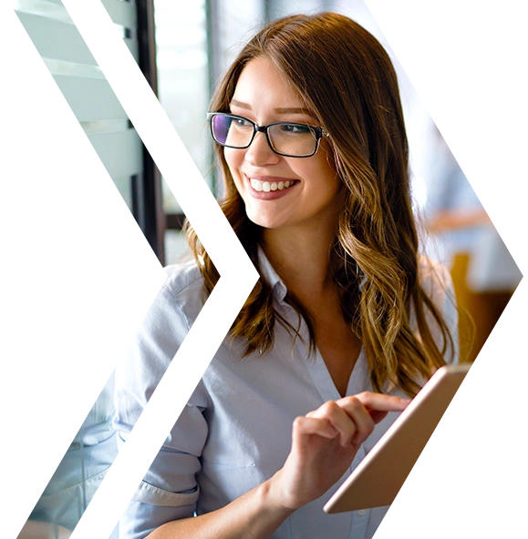 CTA - Smiling professional working on a tablet, symbolising secure, automated Regular Backups for business continuity and rapid recovery.