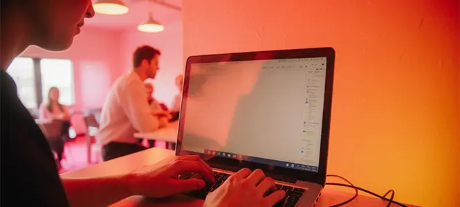 Professional working on laptop, representing cybersecurity and data protection for nonprofit organisations Professional working on laptop, representing cybersecurity and data protection for nonprofit organisations