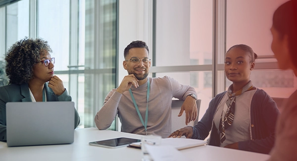 Business team reviewing cybersecurity compliance and insurance requirements Business team reviewing cybersecurity compliance and insurance requirements